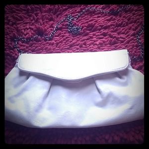 Super cute white bag .